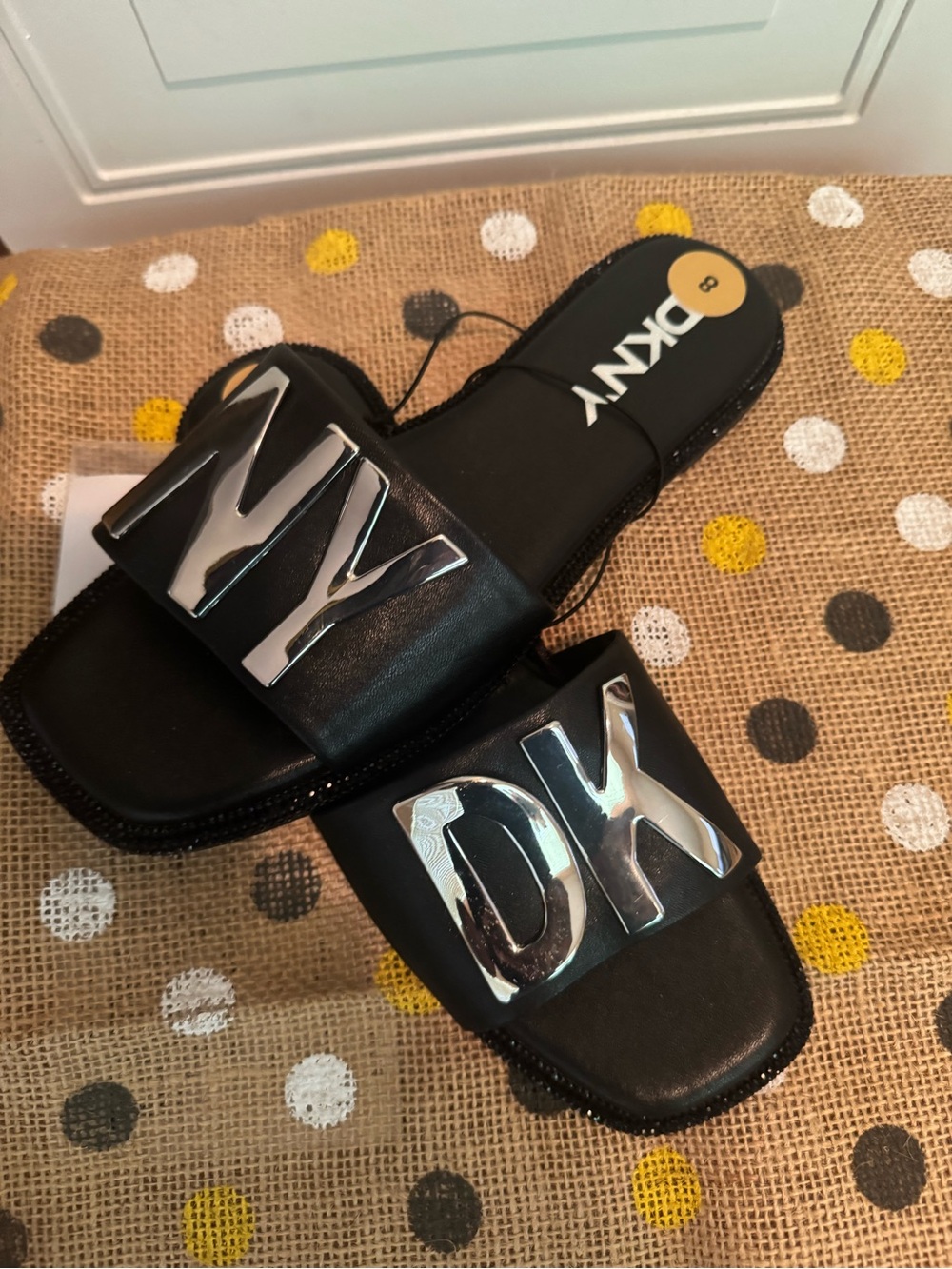 DKNY Black Slide Sandals with Silver Logo Plate - Picture 3 of 5